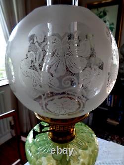 A Beautiful 24.1/2 Tall Victorian Green Vaseline Glass Twin Duplex Oil Lamp