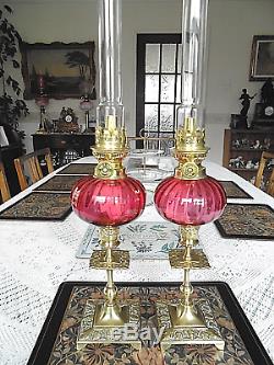 A Beautiful Pair Of Cranberry French / Victorian Style Peg Oil Lamps