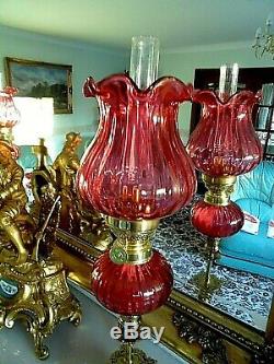 A Beautiful Pair Of Fine Quality Cranberry Victorian Style Peg Oil Lamps