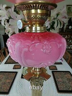 A Large Antique Cranberry Victorian Banquet Table Oil Lamp