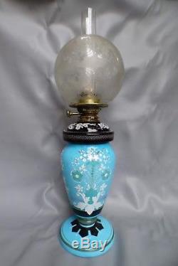A Lovely Blue Glass Based Victorian Oil Lamp With Black Glass Reservoir