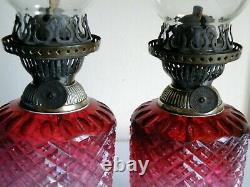 A Pair Of Victorian Cranberry Glass Table Oil Lamps