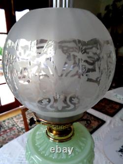 A Quality 25.1/2 Tall Victorian Green Vaseline Glass Twin Duplex Oil Lamp