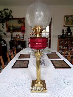 A Quality 27 Tall Victorian Cranberry Corinthian Column Twin Duplex Oil Lamp