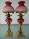 A Rare Etch Matching Pair Of Genuine Victorian Period French Ruby Peg Oil Lamps
