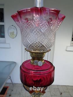A Superb 25 Tall Victorian Cranberry Cut Glass Twin Duplex Oil Lamp