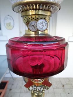 A Superb 25 Tall Victorian Cranberry Cut Glass Twin Duplex Oil Lamp