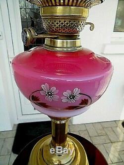 A Superb Cranberry/pink 23 Tall Victorian Twin Duplex Table Oil Lamp