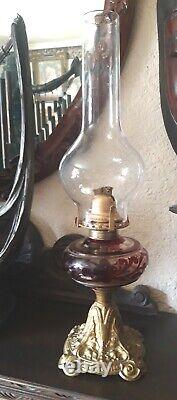 ANTIQUE VICTORIAN Rubby Glass BRITISH MADE OIL LAMP AND CHIMNEY Cast Iron Base