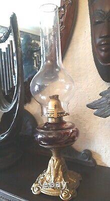 ANTIQUE VICTORIAN Rubby Glass BRITISH MADE OIL LAMP AND CHIMNEY Cast Iron Base