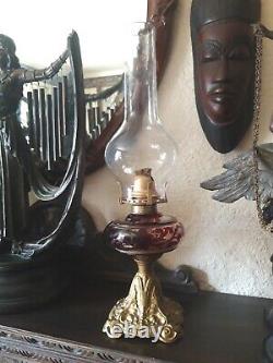 ANTIQUE VICTORIAN Rubby Glass BRITISH MADE OIL LAMP AND CHIMNEY Cast Iron Base