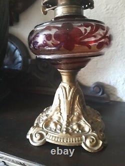 ANTIQUE VICTORIAN Rubby Glass BRITISH MADE OIL LAMP AND CHIMNEY Cast Iron Base