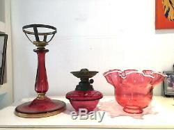 ANTIQUE cranberry glass oil lamp with gold greek key design and frilly shade