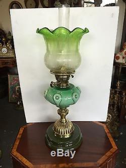 An Antique Green Oil Lamp