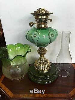 An Antique Green Oil Lamp