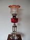 An Antique Victorian(c1880)silver Lion Oil Lamp-cranberry Glass Tulip Shade