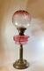 Antique Cranberry Glass Oil Lamp Brass Column Base Moulded Cranberry Glass Shade