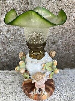 Antique Porcelain Cherub oil lamp