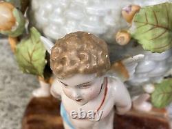 Antique Porcelain Cherub oil lamp