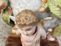 Antique Porcelain Cherub oil lamp