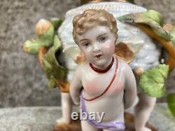 Antique Porcelain Cherub oil lamp