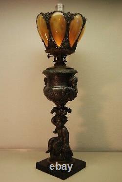 Antique Rococo Victorian Boston Sandwich Slag Amber Glass Kerosene Cherub Lamp