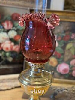 Antique Victorian Lampe Veritas Brass Oil Lamp with Cranberry Glass Shade