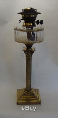 Antique Victorian brass corinthian column with clear glass font oil lamp