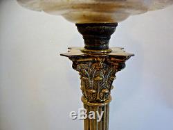 Antique Victorian brass corinthian column with clear glass font oil lamp