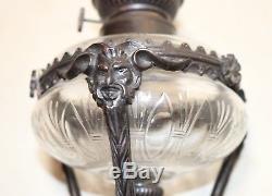 Antique Victorian style figural devil bronze cut crystal glass footed oil lamp
