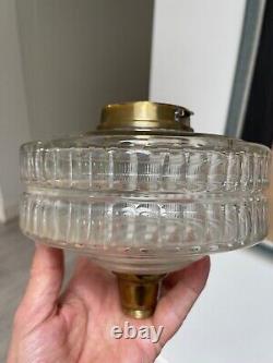 Antique bras art nouveau oil lamp with a facet cut clear font and duplex burner