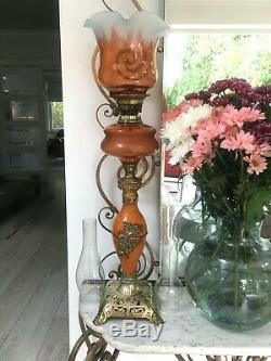 Antique burnt orange oil lamp metal and brass, orange tulip shade