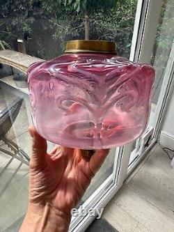 Antique cranberry and opalescent trails on the glass oil lamp font