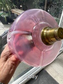Antique cranberry and opalescent trails on the glass oil lamp font