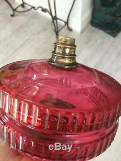 Antique large cranberry facet cut tiered oil lamp