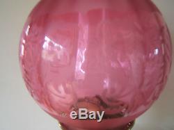 Antique oil lamp cranberry shade corinthian column very shiny working OL19