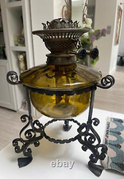 Antique olive green glass wrought iron Messenger oil lamp