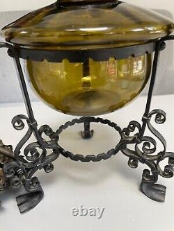 Antique olive green glass wrought iron Messenger oil lamp