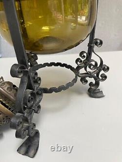 Antique olive green glass wrought iron Messenger oil lamp