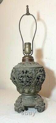 Antique ornate Victorian style reticulated figural electrified oil table lamp