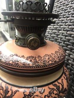 Antique pink and black foliate ceramic hinks oil lamp