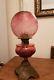 Antique victorian cranberry glass oil lamp