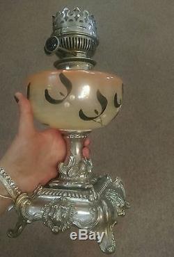 Antique victorian lion head base oil lamp light with glass centre ornate lamp