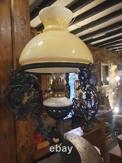 Antique wall mounted Oil Lamp ornate iron wall bracket glass shade single burner
