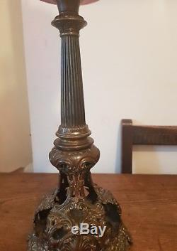 Beautiful tall brass and cranberry glass oil lamp