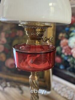 Converted Embossed Brass Oil Lamp with Cranberry Glass Reservoir