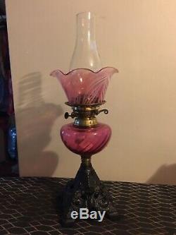 Cranberry antique oil lamps