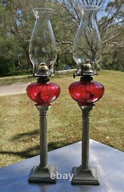 Cranberry glass oil lamps