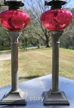 Cranberry glass oil lamps