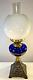 DUPLEX Oil Lamp Cast Base Blue Glass Font Clear Glass Chimney & Milk Glass Shade